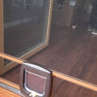 Moskitiery Kraków - moskitiery drzwiowe z przejściem dla zwierząt