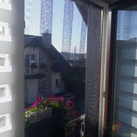 Moskitiery Kraków - moskitiery panelowe pionowe